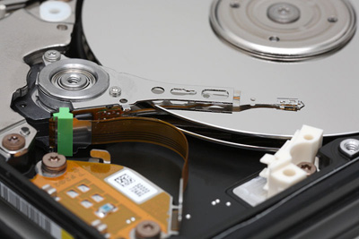 Inner workings of healthy Hard Disk Drive. Look at the perfect condition of the Hard Disk Platters.
