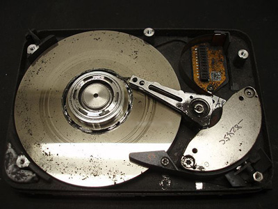 Inner workings of healthy Hard Disk Drive. Look at the perfect condition of the Hard Disk Platters.